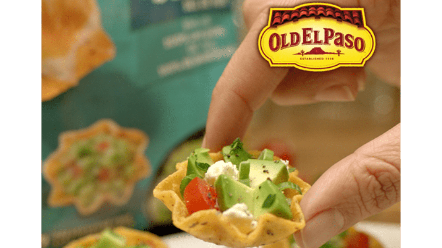 Old El Paso tortilla bowls filled with avocado, feta cheese and cherry tomatoes